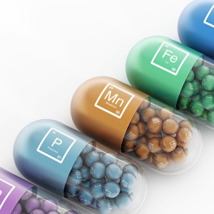 Models of pills that are all multi-colored and of different minerals